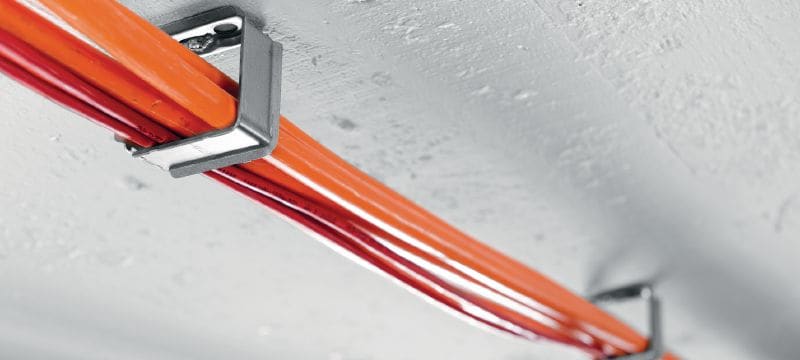 Attache-câble métallique X-ECH-FE MX Attache pour les câbles en faisceau à fixer avec des clous en bande ou des chevilles aux plafonds ou sur les murs Applications 1